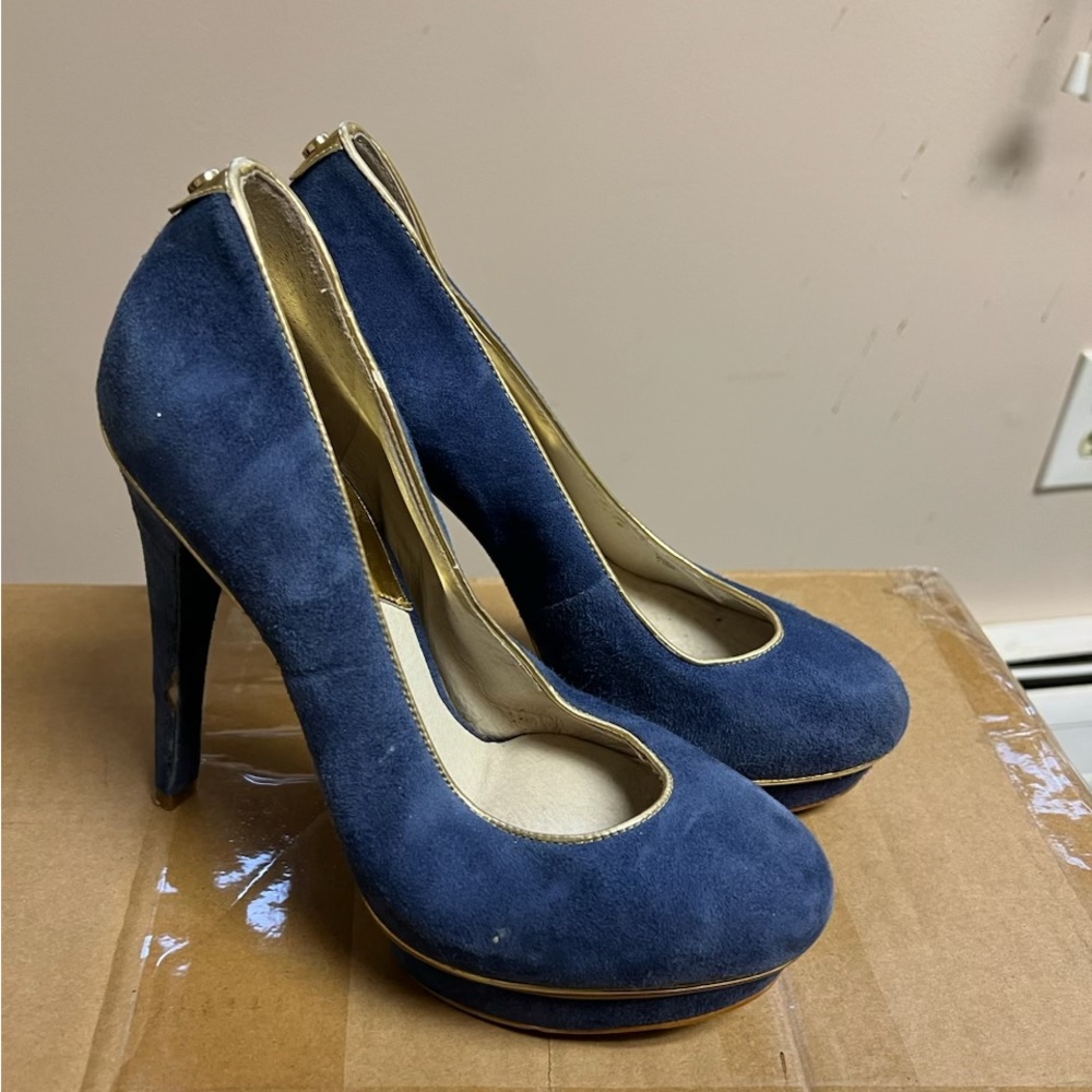 Blue suede heels with gold trim